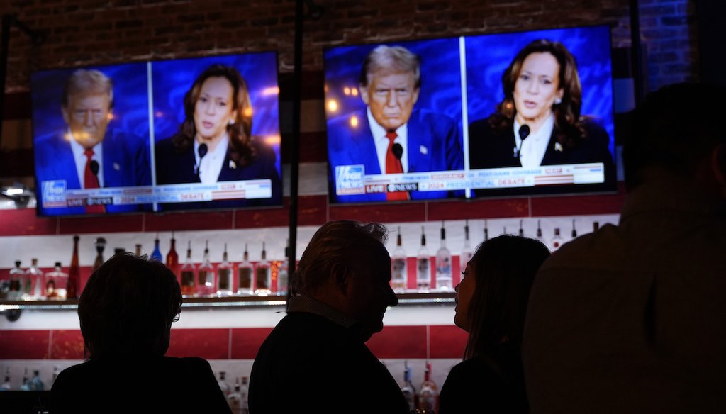 Viewers gather to watch a debate between Vice President Kamala Harris and former President Donald Trump at the Angry Elephant Bar and Grill, Sept. 10, 2024, in San Antonio. (AP)