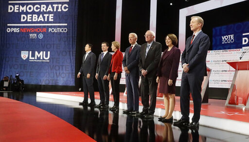 Democratic presidential candidates stand on stage before a Democratic presidential primary debate Thursday, Dec. 19, 2019, in Los Angeles, Calif. (AP)