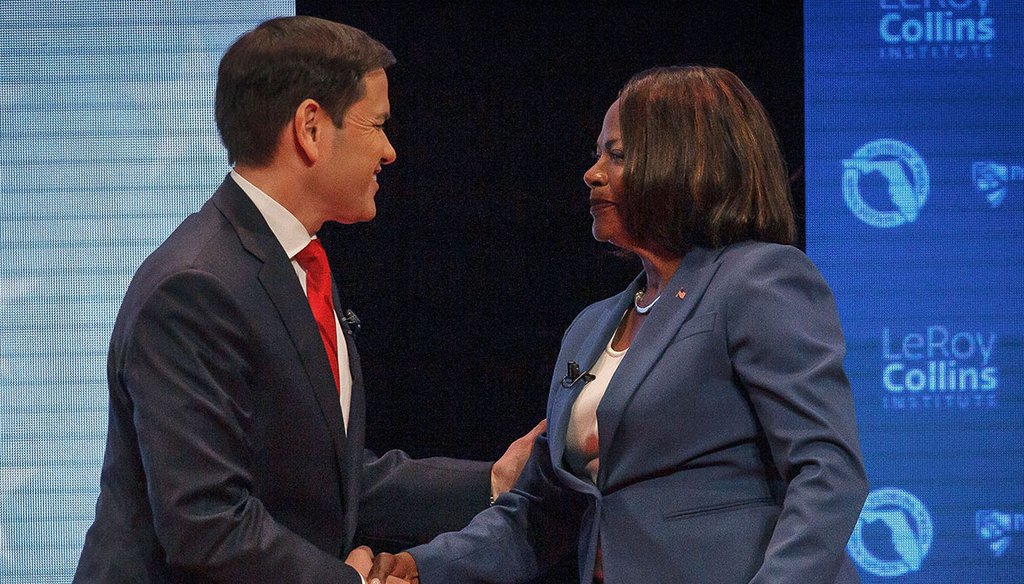 Florida Senate candidates Marco Rubio and Val Demings shake hands before a televised debate Oct. 18 at the Duncan Theater on the campus of Palm Beach State College in Palm Beach County, Fla. (AP)