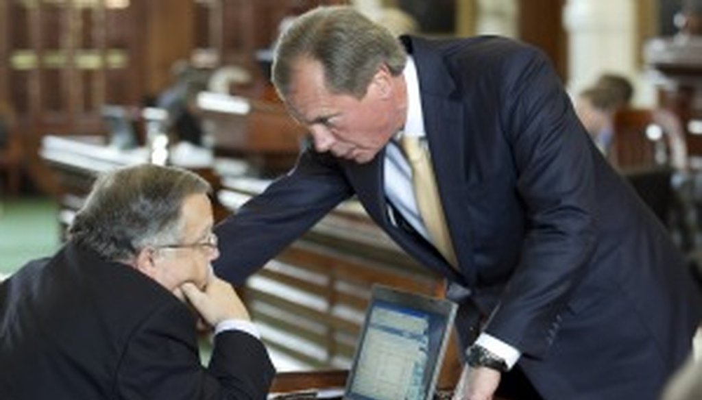 David Dewhurst talks to state Sen. John Carona in May (Austin American-Statesman photo by Jay Janner).