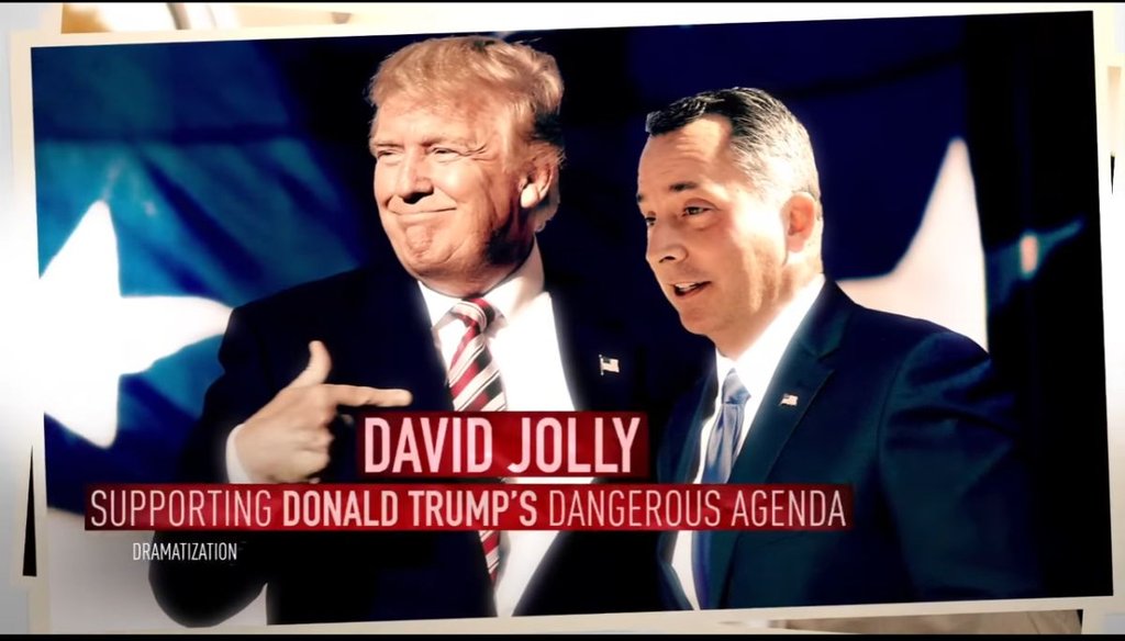 Donald Trump and David Jolly shake hands in this Photoshopped photo from the DCCC's ad. 