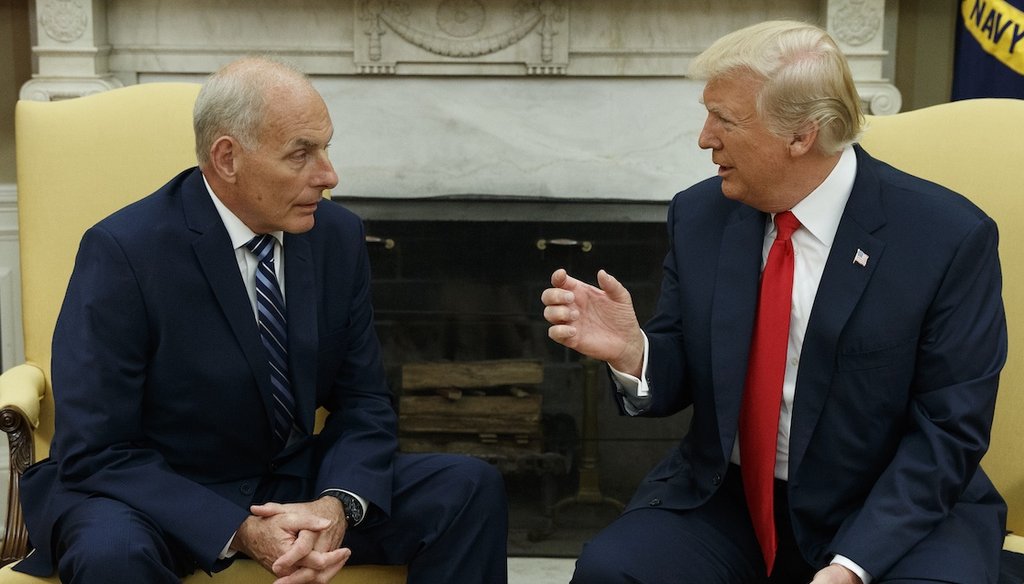 Then-President Donald Trump talks White House Chief of Staff John Kelly on July 31, 2017, in the White House’s Oval Office. (AP)