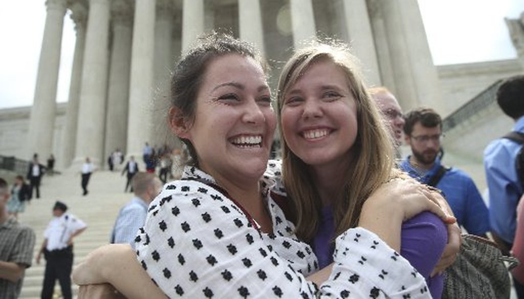 Celebrants outside the U.S. Supreme Court building after the court upheld legality of same-sex marriage June 26, 2015. Texas voters defined marriage as between one man and one woman in a November 2005 vote (New York Times photo, Doug Mills).