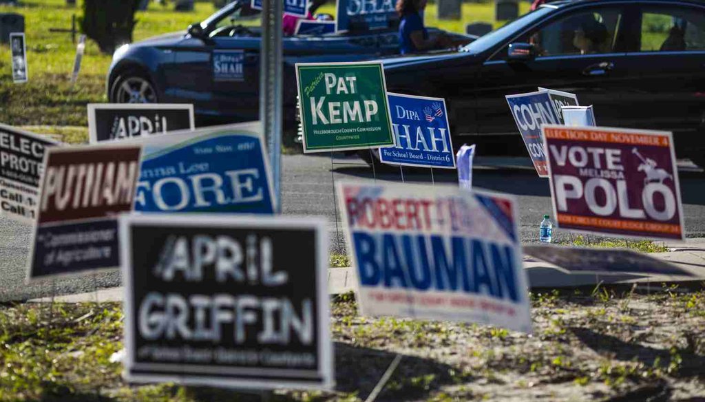 Signs outside a polling place in Tampa, Fla. (Tampa Bay Times photo)