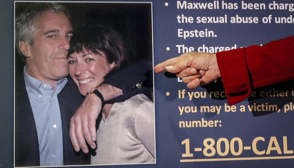A New York prosecutor points to a photo of Jeffrey Epstein and Ghislaine Maxwell at a 2020 news conference. (AP)