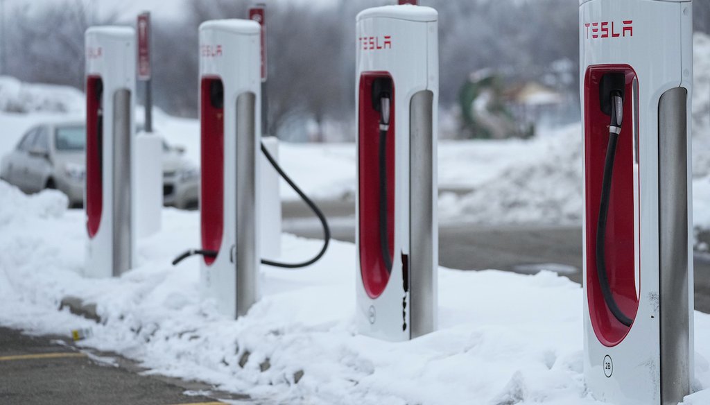 Tesla charging stations in Robbinsdale, Minn. (AP Photo/Abbie Parr)