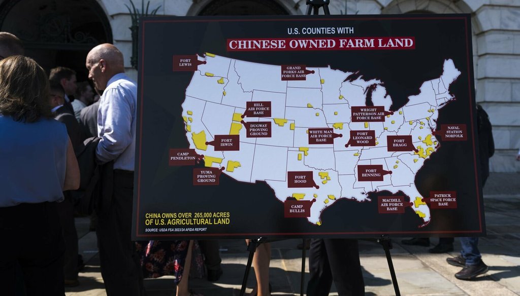 A United States map shows Chinese-owned farm land, highlighted in yellow, situated close to U.S. military bases, colored brown, during a news conference at the Department of Agriculture to rollout the USDA's new plan, July 8, 2025. (AP)