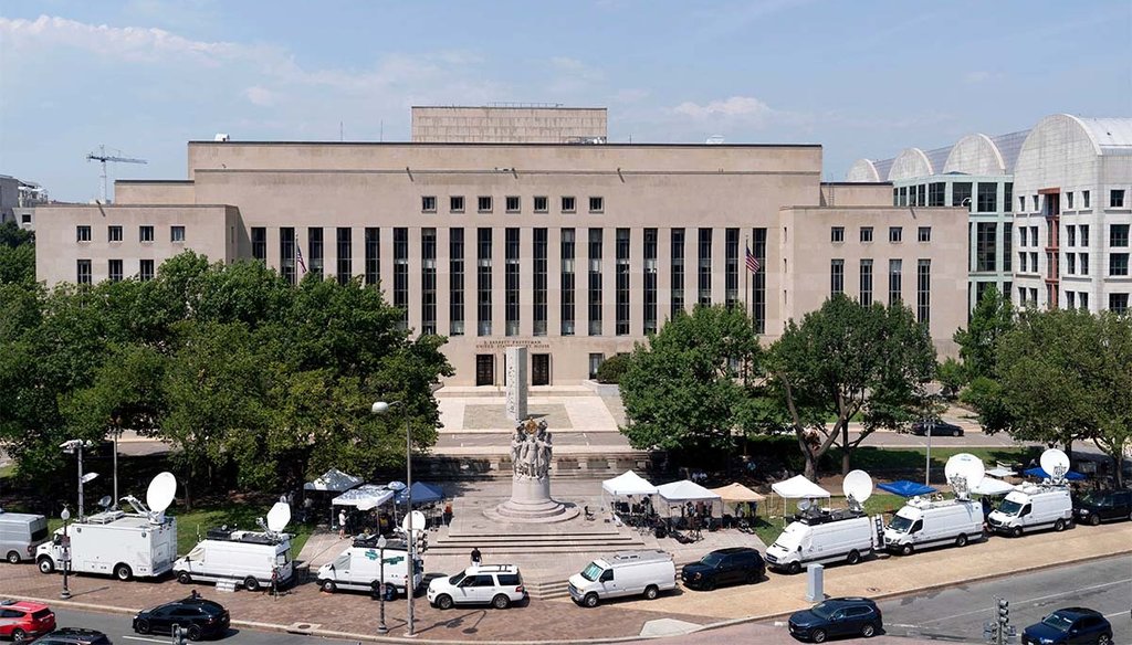 Television crews park outside federal court Tuesday, Aug. 1, 2023 in Washington. Former President Donald Trump has been charged by the Justice Department for his efforts to overturn the results of the 2020 presidential election. (AP)