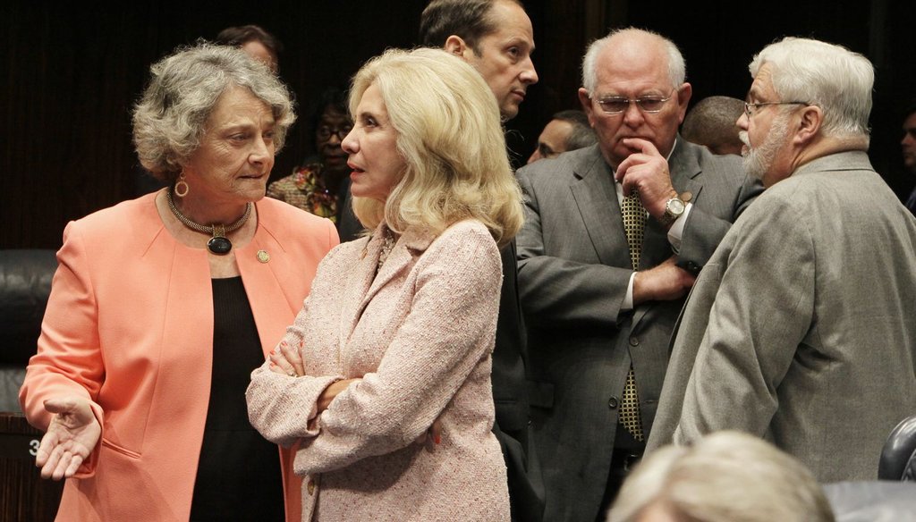 As word spread through the Florida Senate on April 28 that the Florida House had Sine Die for the 2015 session, Florida Senators huddle. Left to Right are Sens. Nancy Detert, Maria Sachs, Joe Negron, Bill Montford, and Jack Latvala. (Tampa Bay Times)