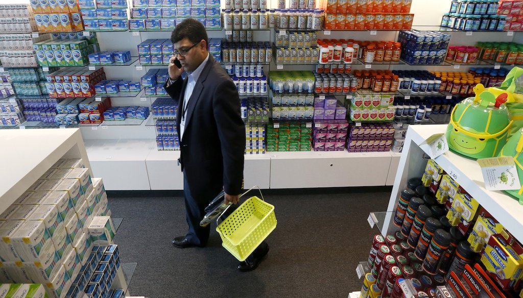 In this photo from May 13, 2015, a a Bayer Pharmaceuticals employee shops at the employee shop in the company's facility in Whippany, N.J. (AP)