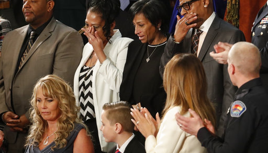 From top left, Robert Mickens, Elizabeth Alvarado, Evelyn Rodriguez, Freddy Cuevas, parents of two Long Island teenagers who were believed to have been killed by MS-13 gang members, during the State of the Union address Jan. 30, 2018. (AP)