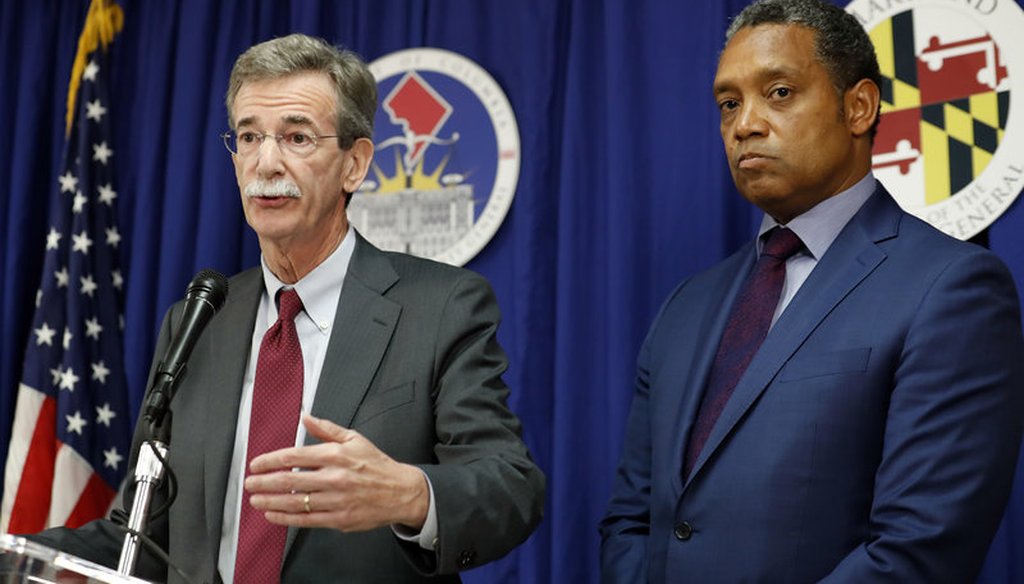 Maryland Attorney General Brian Frosh (left) and District of Columbia Attorney General Karl Racine announce a lawsuit against President Trump over conflicts of interest with his businesses in June in Washington. (AP)
