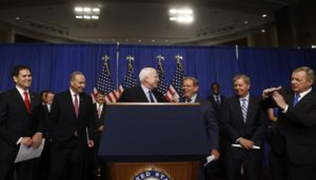 Sen. John McCain, center, and other members of the Gang of Eight talked immigration reform in Washington in April.