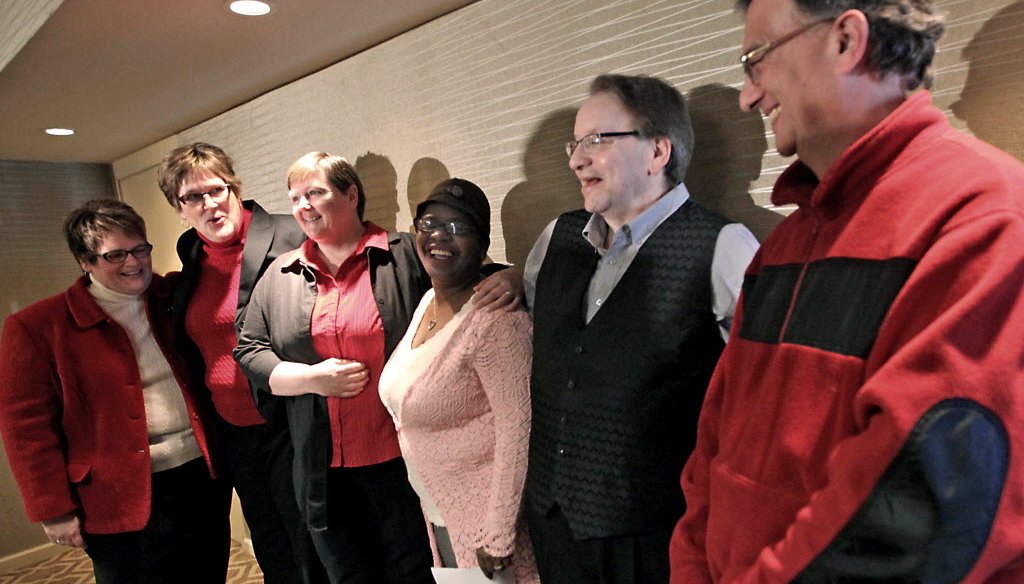 Plaintiffs in a federal lawsuit challenging Wisconsin's ban on gay marriage appear during a press conference at the Concourse Hotel in Madison, Feb. 3, 2014. AP