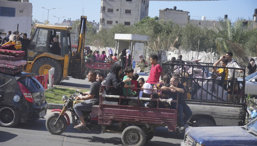 Palestinians flee to the southern Gaza Strip on Oct. 13, 2023, after the Israeli army issued an evacuation warning to a population of over 1 million in northern Gaza and Gaza City. (AP)