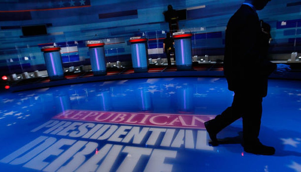 Workers prepare the stage for the January 2012 Fox News/Wall Street Journal/South Carolina GOP debate among Republican presidential candidates. (Getty)