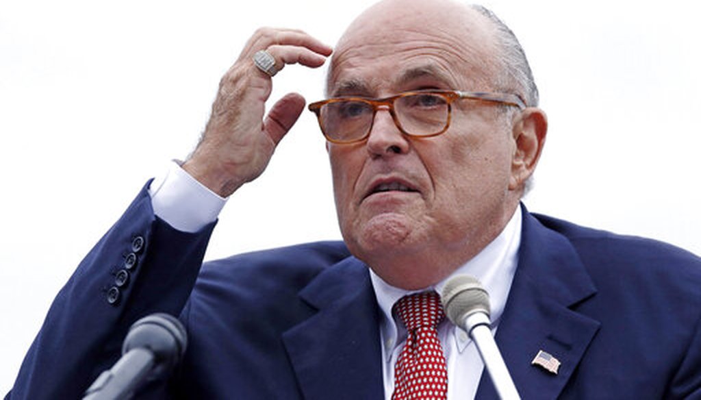 Rudy Giuliani addresses a gathering during a campaign event for Eddie Edwards in Portsmouth, N.H. on Aug. 1, 2018. (AP/Krupa)