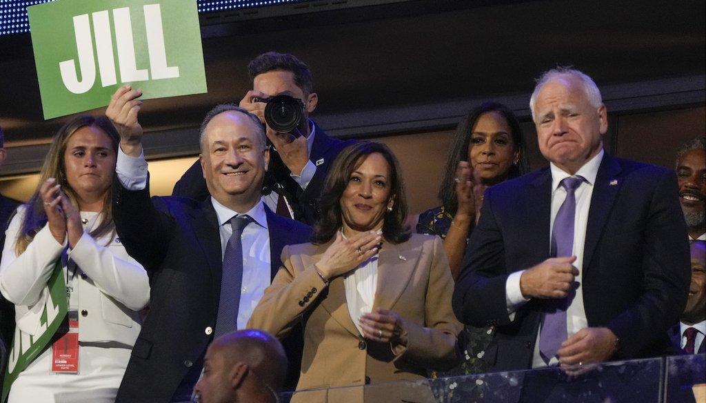 Democratic presidential nominee Vice President Kamala Harris, second gentleman Doug Emhoff and Democratic vice presidential candidate Minnesota Gov. Tim Walz listen as first lady Jill Biden speaks Aug. 19, 2024, during the first day of Democratic National