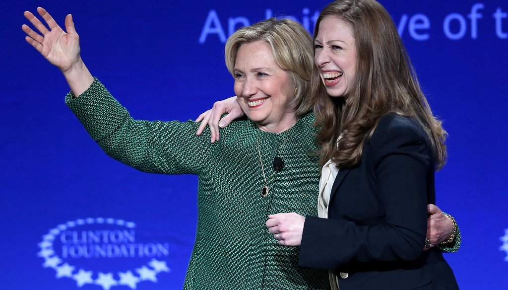 Hillary Clinton and her daughter Chelsea Clinton embrace as they attend the 2015 meeting of the Clinton Global Initiative. (Getty)