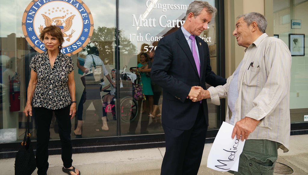 U.S. Rep. Matt Cartwright shakes hands with Michael Precone (right) after a meeting with medicare and medicaid recipients in Scranton Tuesday, July 31, 2018.