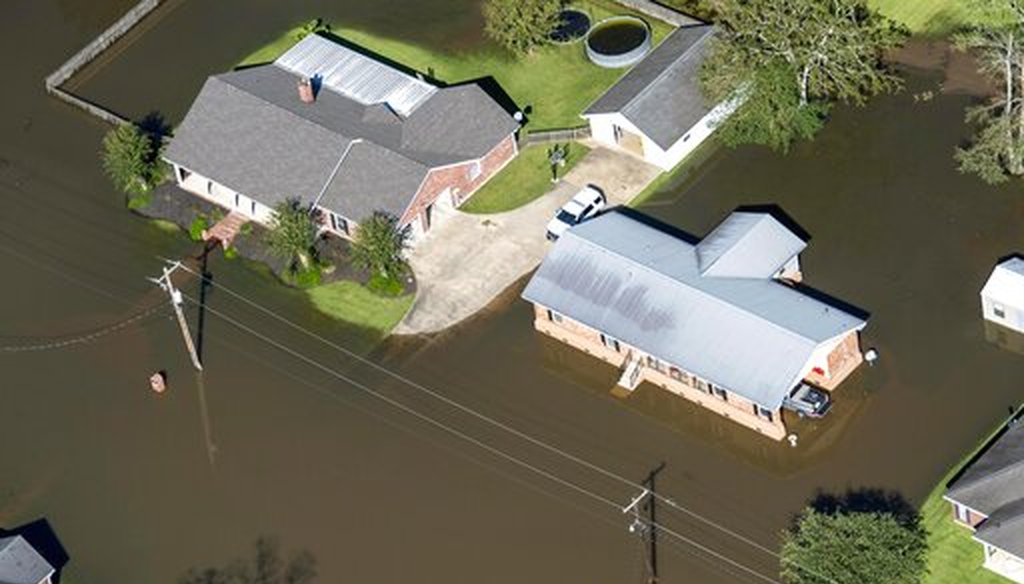 Houses surrounded by flood waters are seen in the aftermath of Hurricane Delta Saturday Oct. 10, 2020, in Welsh, La. (AP)
