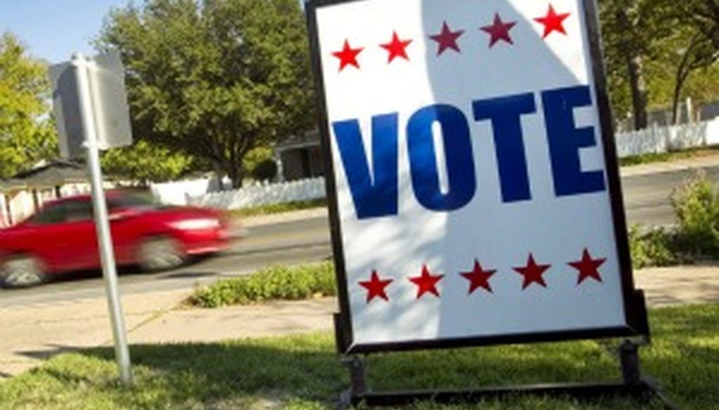 A sign encourages voting in Austin at an odd time, October 2011 (Source: Austin American-Statesman photo, Jay Janner).