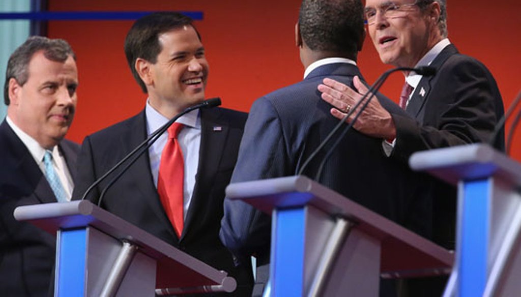 Republican presidential candidates N.J. Gov. Chris Christie, Florida Sen. Marco Rubio, Ben Carson and former Gov. Jeb Bush visit during a break at the first GOP debate in Cleveland on Aug. 6, 2015. (Getty Images)