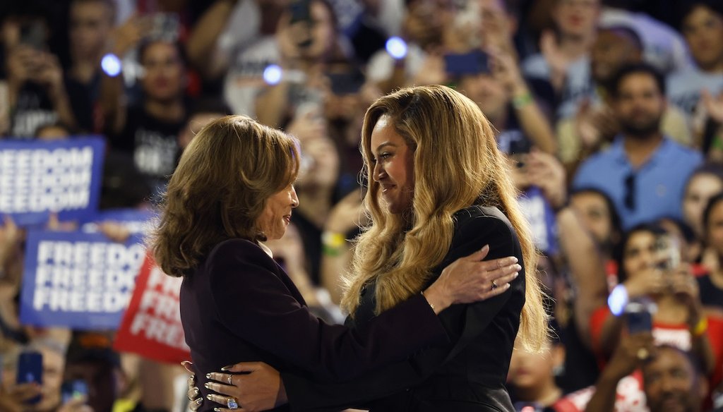 Singer-songwriter Beyonce, right, and Democratic presidential nominee Vice President Kamala Harris, left, embrace onstage Oct. 25, 2024, during a campaign rally in Houston. (AP)