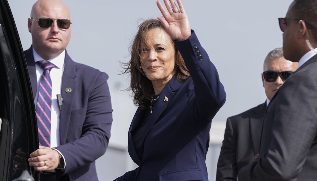 Vice President Kamala Harris waves as she walks across the tarmac during her arrival, July 31, 2024, in Houston. (AP)