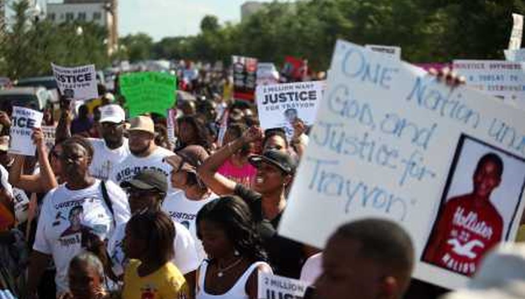 A crowd rallies outside a city commission meeting in Sanford. Photo by Kathleen Flynn/Tampa Bay Times.