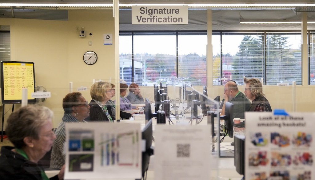 Workers verify ballot signatures Nov. 7, 2023, on Election Day at the King County Elections headquarters in Renton, Wash. (AP)