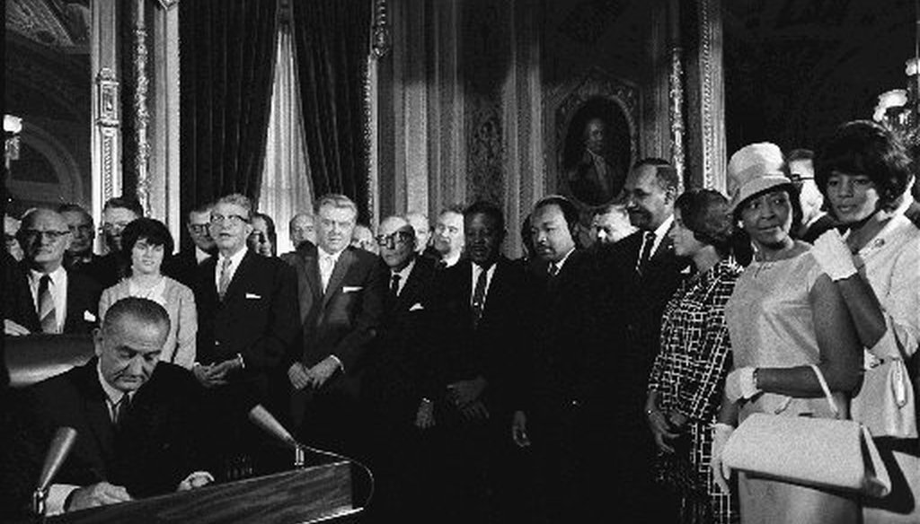 President Lyndon B. Johnson signed the Voting Rights Act into law Aug. 6, 1965 (Photo, LBJ Library / Yoichi Okamoto).