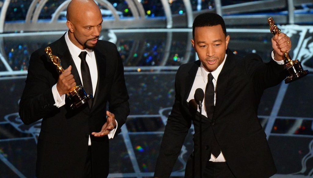 John Legend (right) at the Oscars Sunday night.