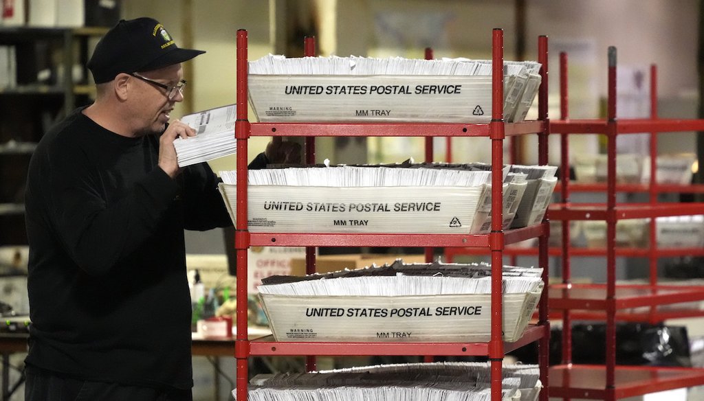 An Allegheny County worker processes mail-in and absentee ballots in Pittsburgh, April 18, 2024. (AP)