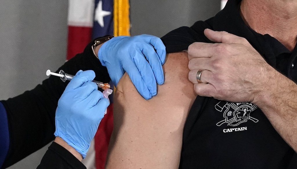 In a Dec.16, 2020 file photo, a Pfizer BioNTech COVID-19 vaccine is administered at the Arizona Department of Health Services State Laboratory in Phoenix. (AP)