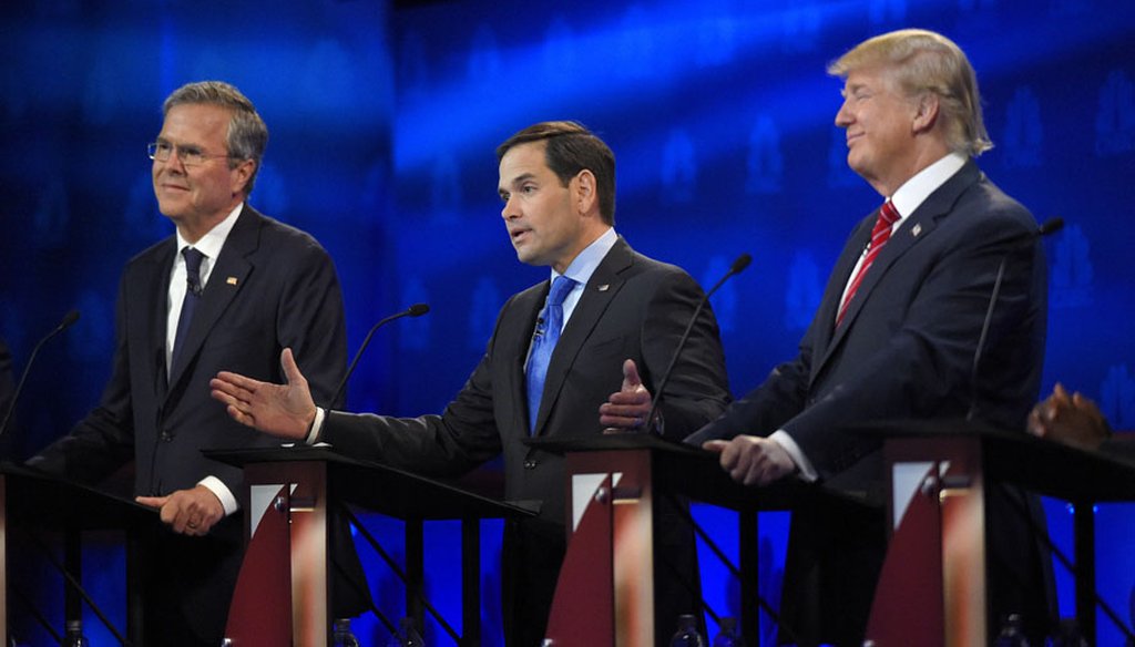 U.S. Sen. Marco Rubio, between Jeb Bush and Donald Trump, speaks at the Republican presidential debate in Boulder, Colo., on Oct. 28, 2015. (AP photo)