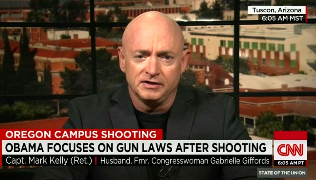 Capt. Mark Kelly, husband of Rep. Gabby Giffords, discusses gun policy with Jake Tapper on CNN's "State of the Union" on Oct. 4, 2015, following the school shooting in Roseburg, Oregon. 