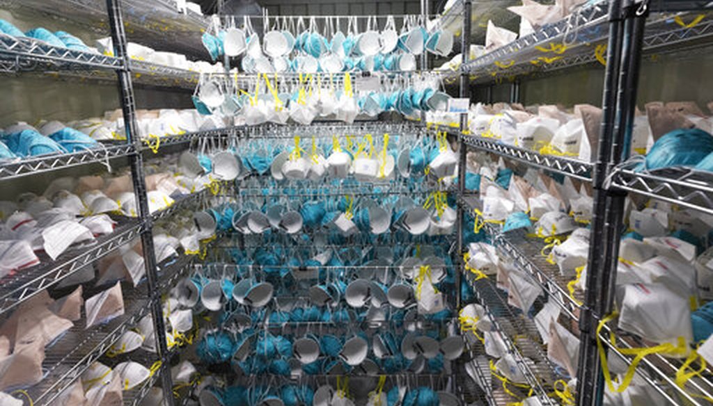Protective masks hang in a decontamination unit at the Battelle N95 decontamination site during the coronavirus pandemic, Saturday, April 11, 2020, in Somerville, Mass. (AP)