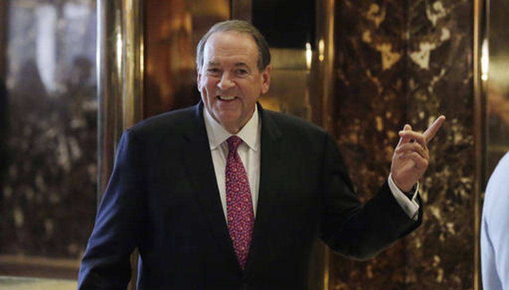 Former Arkansas Gov. Mike Huckabee waits for the elevator at Trump Tower in New York, Friday, Nov. 18, 2016. (AP)