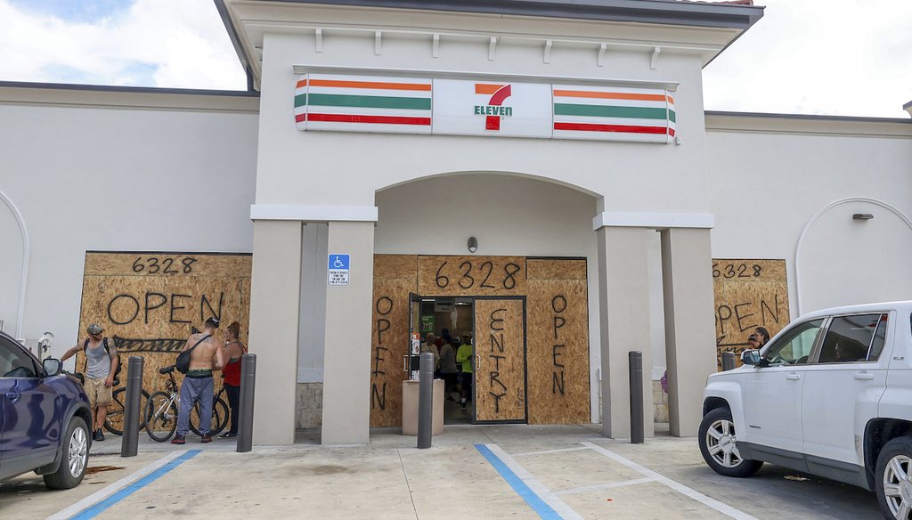 A store boards up but remains open in preparation for Hurricane Milton on Oct. 8, 2024, in New Port Richey, Fla. (AP)