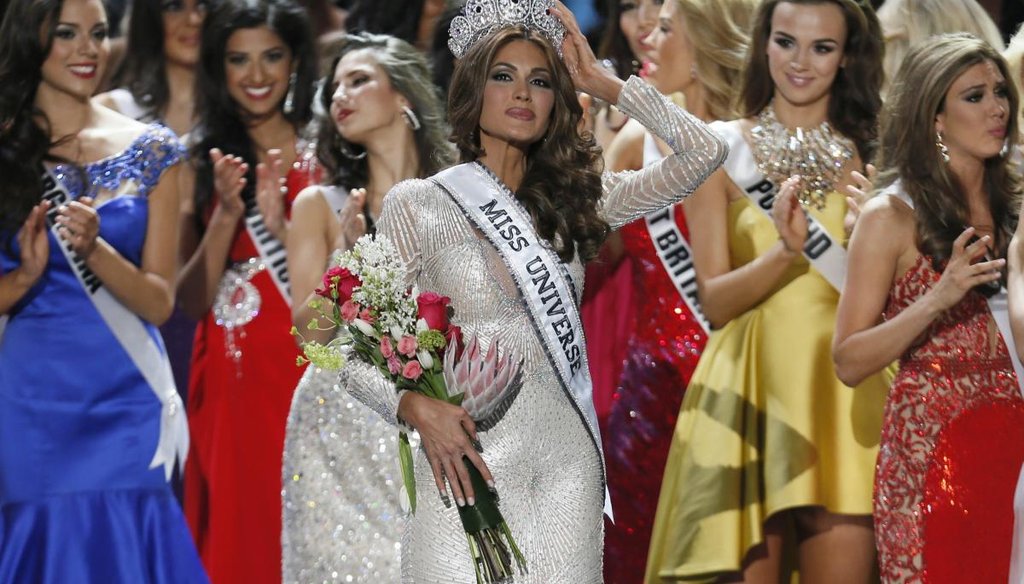 Miss Universe 2013 Gabriela Isler, from Venezuela, adjusts her crown after winning the pageant in Moscow, Russia, on Nov. 9, 2013. (AP)