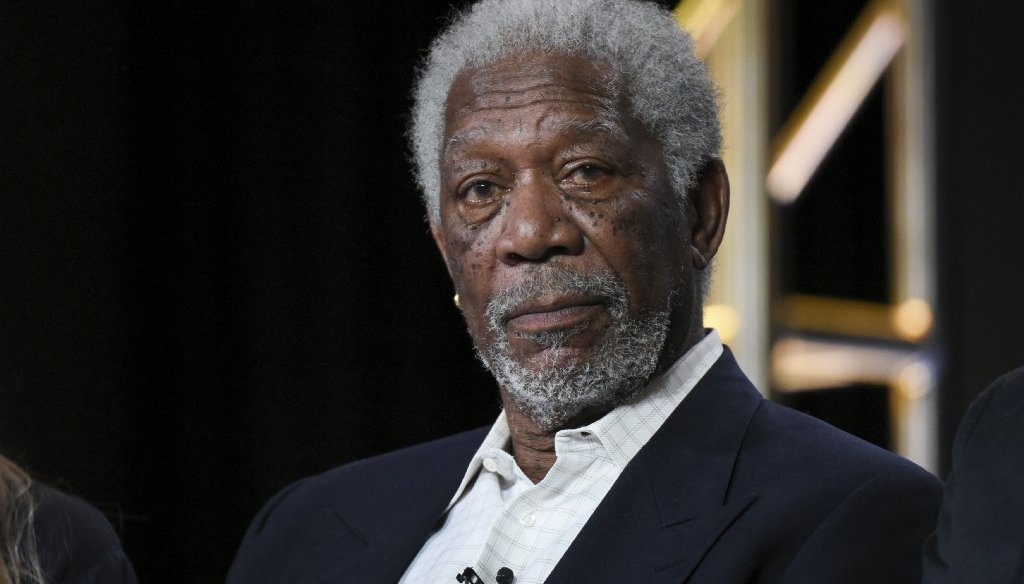 A fake news story claimed that Morgan Freeman said Hillary Clinton should be imprisoned. (AP photo)