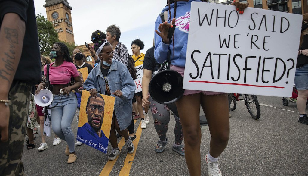 People march for the one year anniversary of George Floyd's death on Sunday, May 23, 2021, in Minneapolis, Minn. (AP)