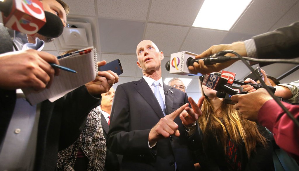Gov. Rick Scott discusses his plan to cut the state's communications services tax during a news conference in Lake Mary on Jan. 20, 2015. (AP photo)