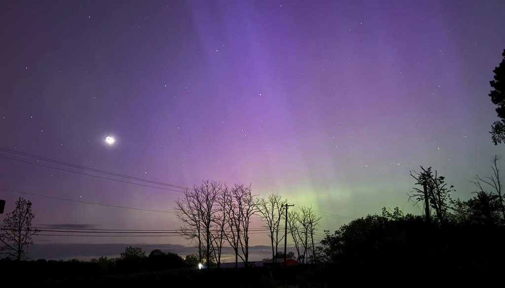 The aurora borealis, also known as the northern lights, is visible over Ann Arbor, Mich., early May, 11, 2024. Brilliant purple, green, yellow and pink hues of the Northern Lights were reported worldwide. (AP)