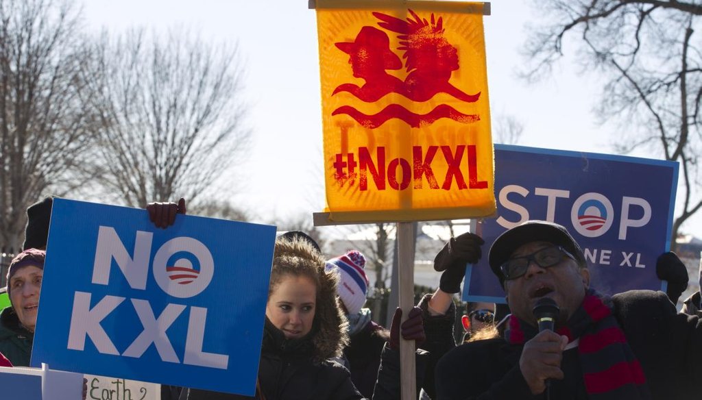 Supporters cheer President Barack Obama's pledge to veto a Keystone XL bill from Congress on Jan. 10, 2015, outside the White House.