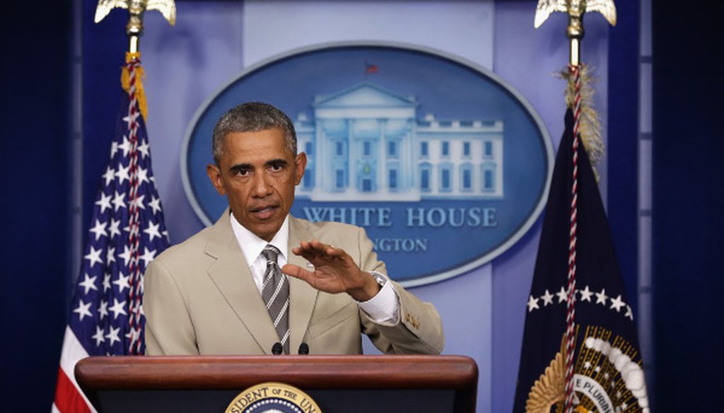 President Barack Obama speaks in the White House press room Aug. 28 ... in a tan suit?