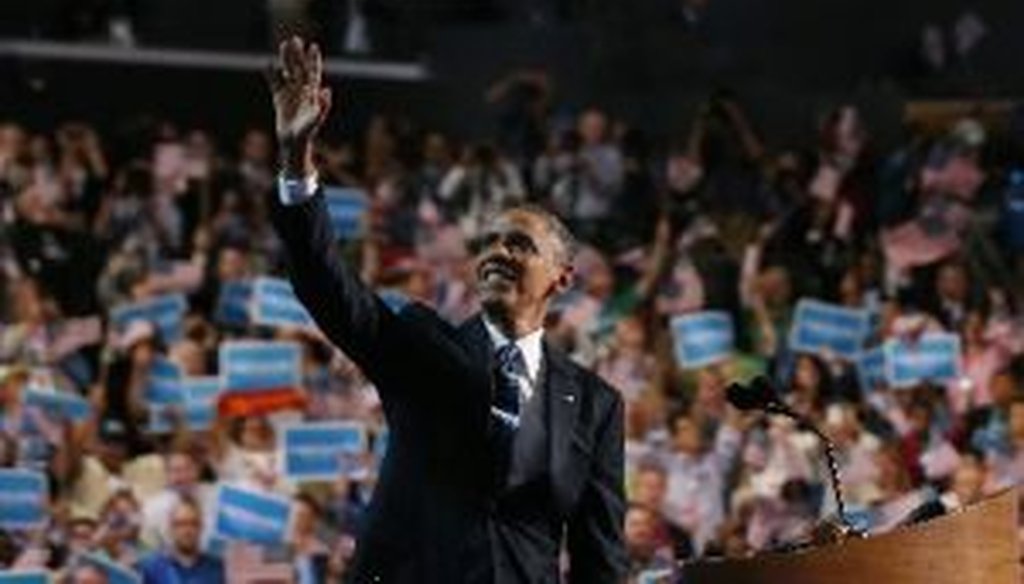 President Barack Obama waves to delegates before giving his acceptance speech at the Democratic National Convention.