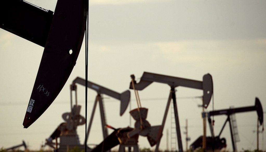 Pumpjacks draw oil out of the ground in a field near Lovington, N.M. (AP Photo/Charlie Riedel)