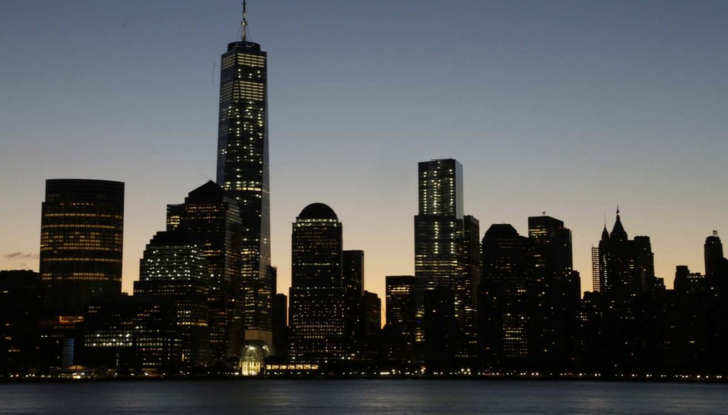 One World Trade Center dominates the lower Manhattan skyline on Nov. 3, 2014 in this view from Jersey City, N.J., 13 years after the 9/11 terrorist attack. (AP Photo/Mark Lennihan)